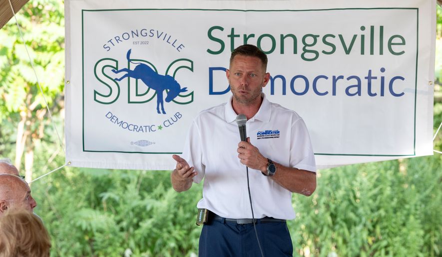 FILE - Brian Poindexter, Democratic nominee for Ohio's 7th congressional district, speaks at the Strongsville Democratic Club meeting, Aug. 5, 2026, in Strongsville, Ohio. (AP Photo/Nate Manley, File)