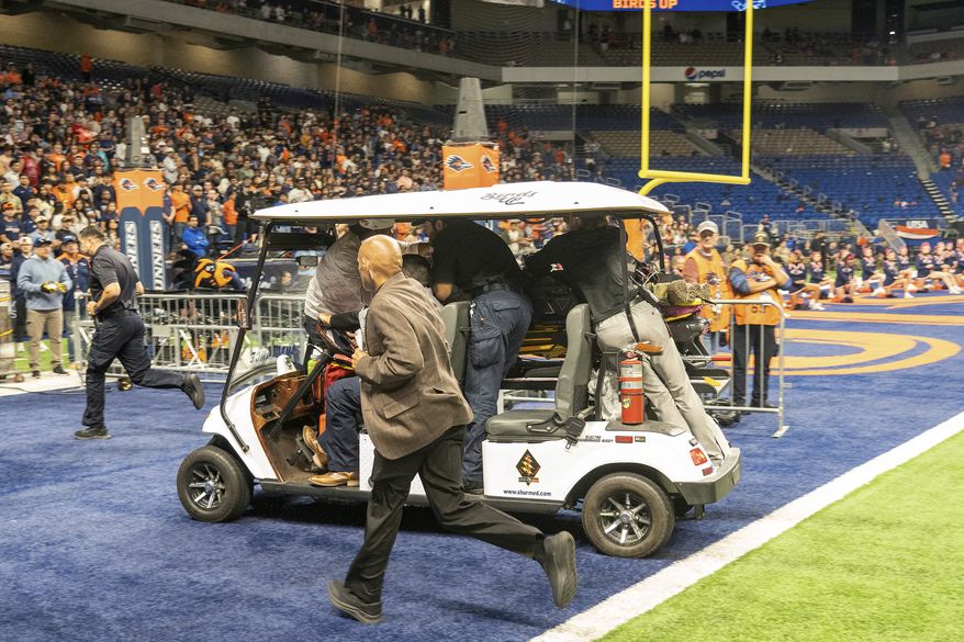 Emergency responders react to an accident before UTSA’s annual Salute to Armed Forces and Veterans football game at the Alamodome, Saturday, Oct. 17, 2026 in San Antonio, Texas. (Cody Duty/The San Antonio Express-News via AP)