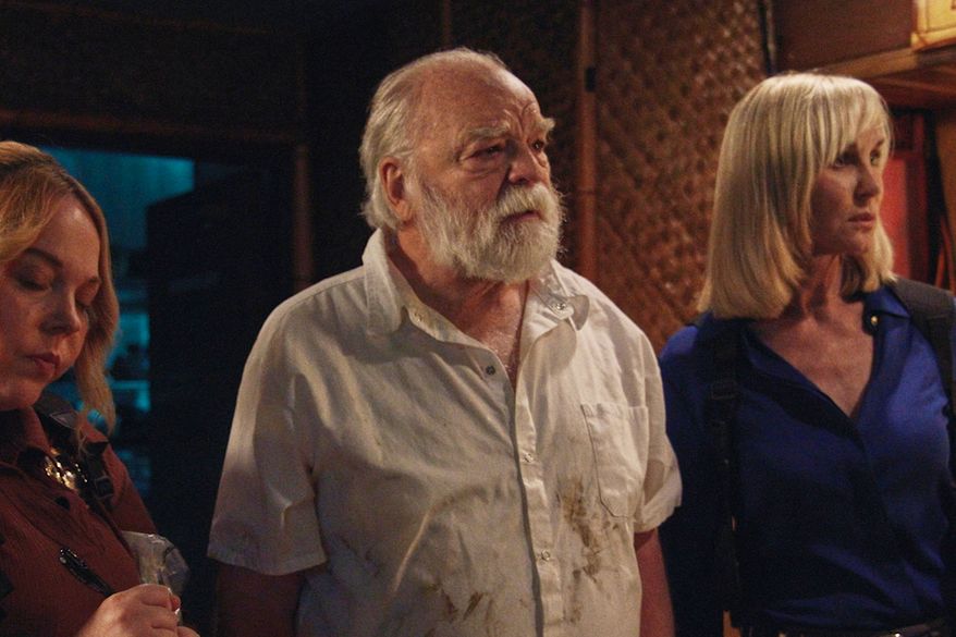 This image released by Multicom Entertainment Group, Inc. shows Richard Riehle, center, during the filming of "The Cowboy Killer." (Ben Solenberger/ Multicom Entertainment Group, Inc. via AP)