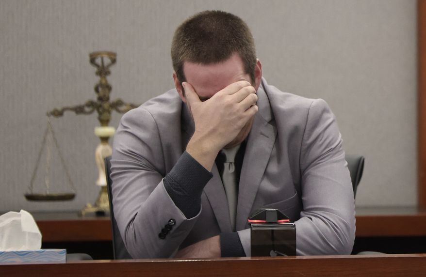 Mitchell Fairbarn breaks down while testifying during his trial at the Regional Justice Center Friday, Oct. 16, 2026, in Las Vegas. Fairbarn is accused of stealing a flamingo from its enclosure at a Las Vegas resort and abusing it. (Benjamin Hager/Las Vegas Review-Journal via AP)