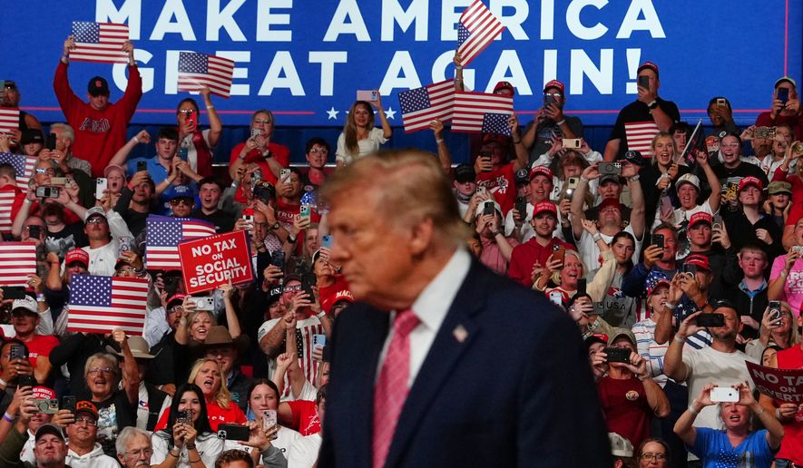 President Donald Trump arrives at a campaign rally at Heartland Credit Union Arena, Monday, Oct. 19, 2026, in Park City, Kan. (AP Photo/Julia Demaree Nikhinson)