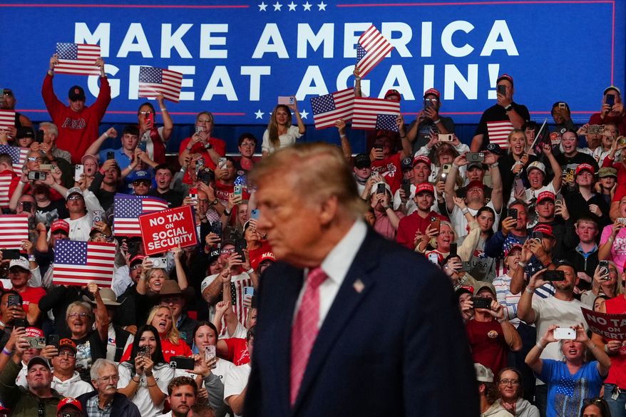President Donald Trump arrives at a campaign rally at Heartland Credit Union Arena, Monday, Oct. 19, 2026, in Park City, Kan. (AP Photo/Julia Demaree Nikhinson)