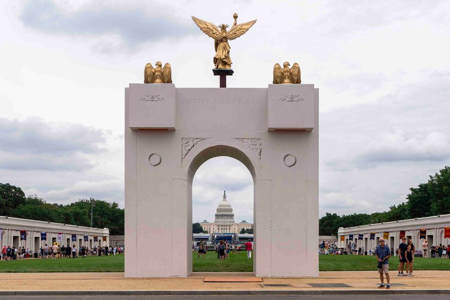 FILE - A mockup of President Donald Trump's proposed triumphal arch stands at the Great American State Fair on the National Mall, June 27, 2026, in Washington. (AP Photo/Jen Golbeck, File)
