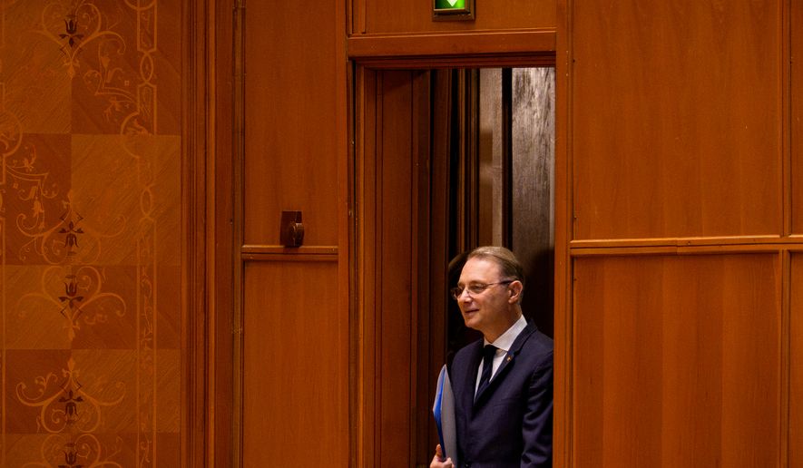 Romanian Prime Minister designate Luca Niculescu arrives for a joint parliament session called to give a vote of confidence for the new government team, in Bucharest, Romania, Tuesday, Oct. 20, 2026. (AP Photo/Andreea Alexandru)