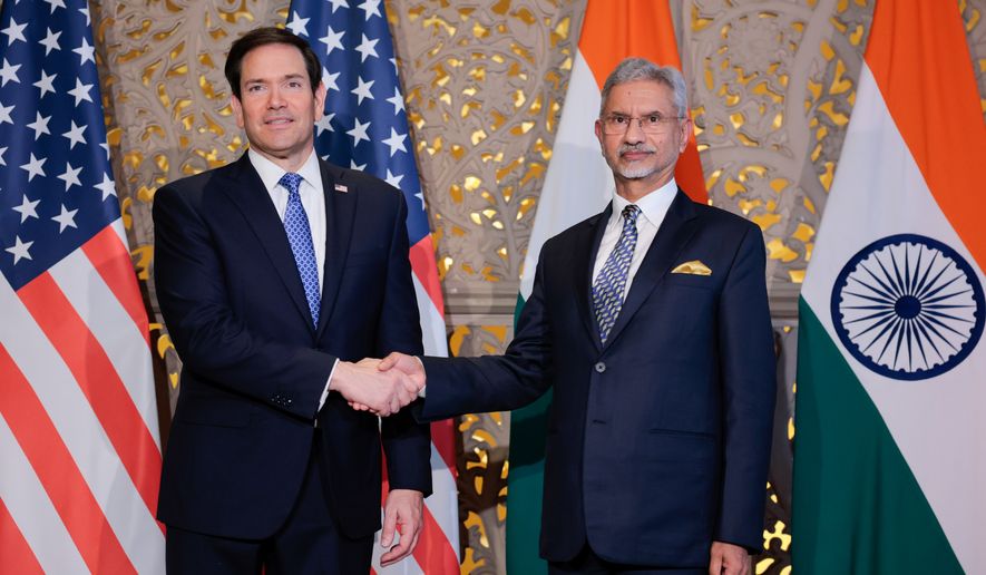 US Secretary of State Marco Rubio, left, shakes hands with India's Foreign Minister Subrahmanyam Jaishankar, right, before their meeting in Mumbai, India, Tuesday, Oct. 20, 2026. (Kylie Cooper/Pool Photo via AP)