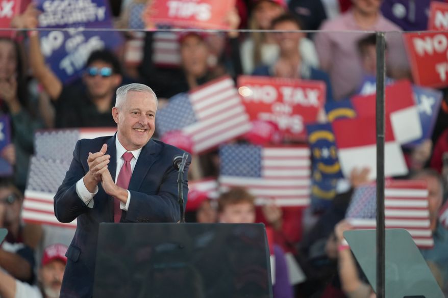 North Carolina U.S. Senate candidate Michael Whatley speaks before President Donald Trump at a campaign rally at Pitt–Greenville Airport, Tuesday, Oct. 20, 2026, in Greenville, N.C. (AP Photo/Matt Ramey)