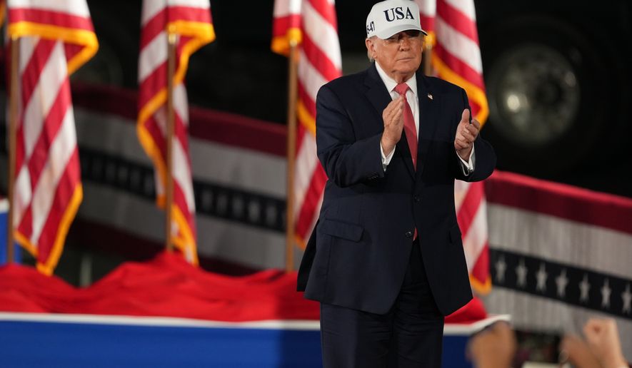 President Donald Trump arrives at a campaign rally at Pitt–Greenville Airport, Tuesday, Oct. 20, 2026, in Greenville, N.C. (AP Photo/Matt Ramey)