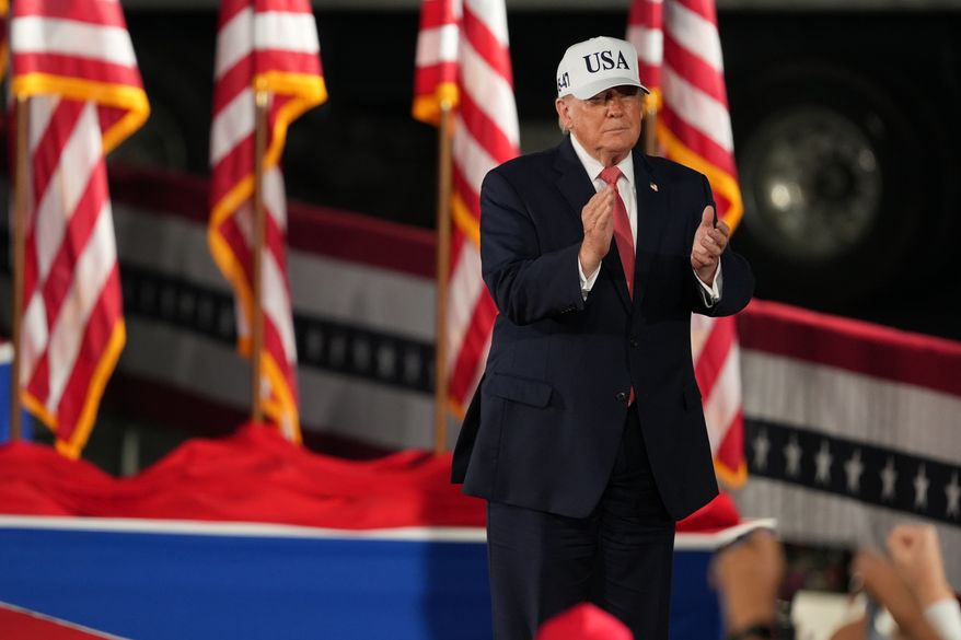 President Donald Trump arrives at a campaign rally at Pitt–Greenville Airport, Tuesday, Oct. 20, 2026, in Greenville, N.C. (AP Photo/Matt Ramey)