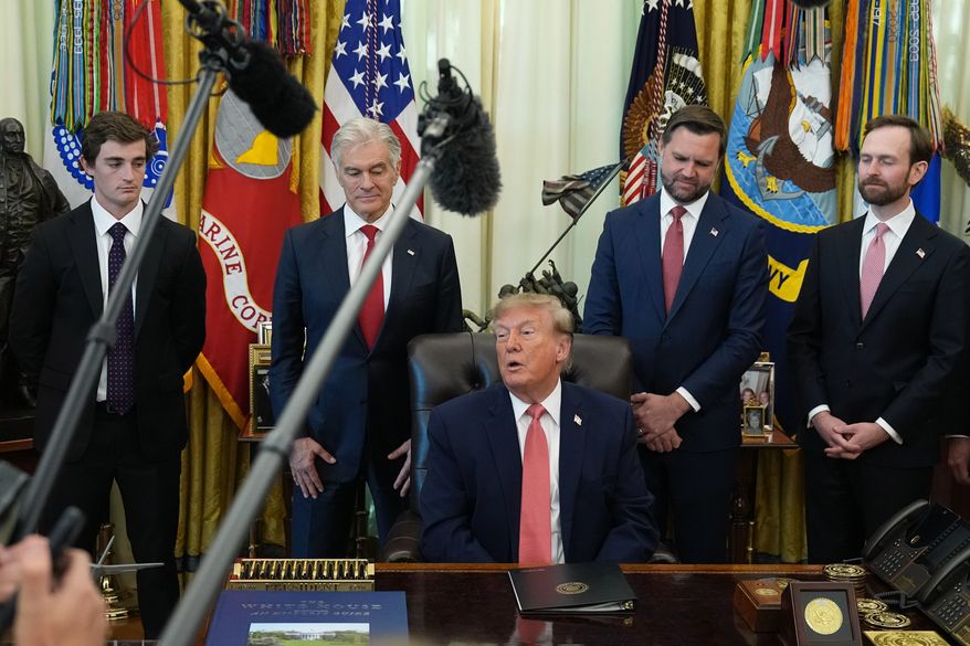 President Donald Trump speaks in the Oval Office of the White House, Tuesday, Oct. 20, 2026, in Washington, as Nick Shirley, from left, Centers for Medicare & Medicaid Services administrator Dr. Mehmet Oz, Vice President JD Vance and Andrew Ferguson, chairman of the Federal Trade Commission, listen. (AP Photo/Jacquelyn Martin)