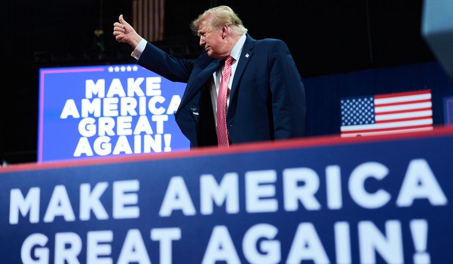 President Donald Trump gives a thumbs-up after speaking during a campaign rally at Heartland Credit Union Arena in Park City, Kan., on Monday, Oct. 19, 2026. (AP Photo/Julia Demaree Nikhinson)