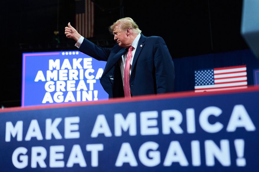 President Donald Trump gives a thumbs-up after speaking during a campaign rally at Heartland Credit Union Arena in Park City, Kan., on Monday, Oct. 19, 2026. (AP Photo/Julia Demaree Nikhinson)