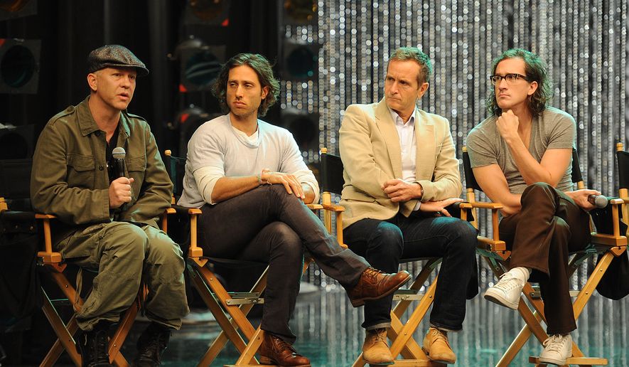 Executive Producers Ryan Murphy, (from left) Brad Falchuk, Dante DiLoreto and Ian Brennan on set for the GLEE taping of the 300th musical performance at Paramount Studios on Wednesday, October 26, 2011 in Los Angeles, California. (Photo by Frank Micelotta/Invision/AP)