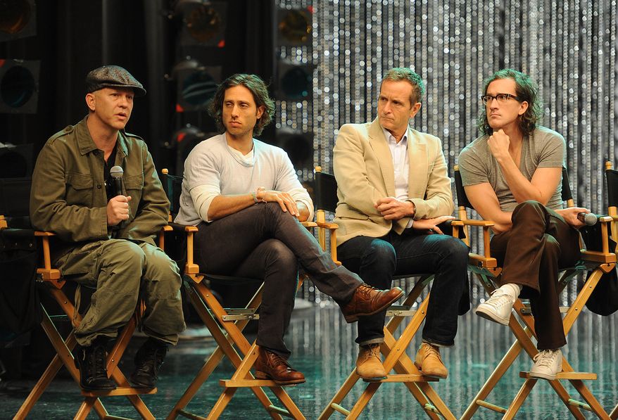 Executive Producers Ryan Murphy, (from left) Brad Falchuk, Dante DiLoreto and Ian Brennan on set for the GLEE taping of the 300th musical performance at Paramount Studios on Wednesday, October 26, 2011 in Los Angeles, California. (Photo by Frank Micelotta/Invision/AP)