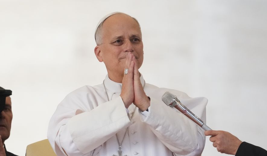 Pope Leo XIV thanks the faithful during his weekly general audience in St. Peter's Square at The Vatican, Wednesday, Oct. 21, 2026. (AP Photo/Gregorio Borgia)