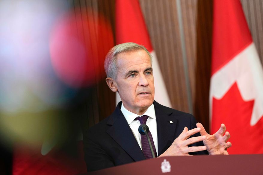 Canada Prime Minister Mark Carney and Ontario Premier Doug Ford, not shown, participate in a joint news conference on Parliament Hill in Ottawa, on Wednesday, Oct. 21, 2026. (Justin Tang/The Canadian Press via AP)