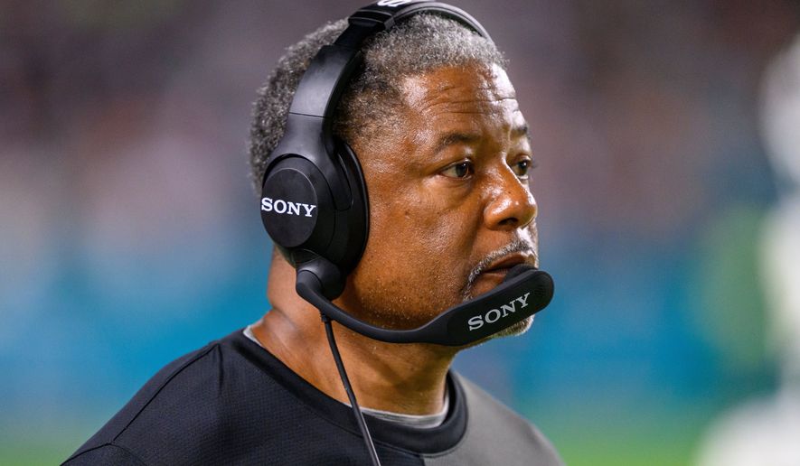 FILE - New York Jets defensive coordinator Steve Wilks watches from the sidelines during an NFL football game against the Miami Dolphins, Sept. 29, 2025, in Miami Gardens, Fla. (AP Photo/Doug Murray, File)