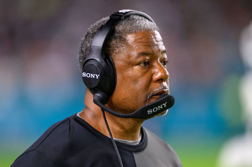 FILE - New York Jets defensive coordinator Steve Wilks watches from the sidelines during an NFL football game against the Miami Dolphins, Sept. 29, 2025, in Miami Gardens, Fla. (AP Photo/Doug Murray, File)