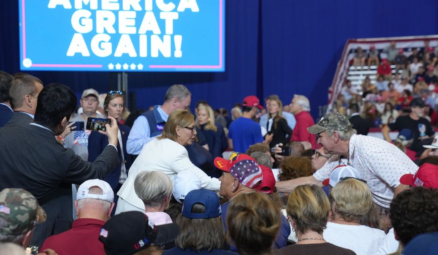 U.S. Sen. Darline Graham, R-S.C., center, shakes hands with a supporter ahead of a midterm rally with President Donald Trump Wednesday, Oct. 21, 2026, in Pendleton, S.C. (AP Photo/Meg Kinnard)