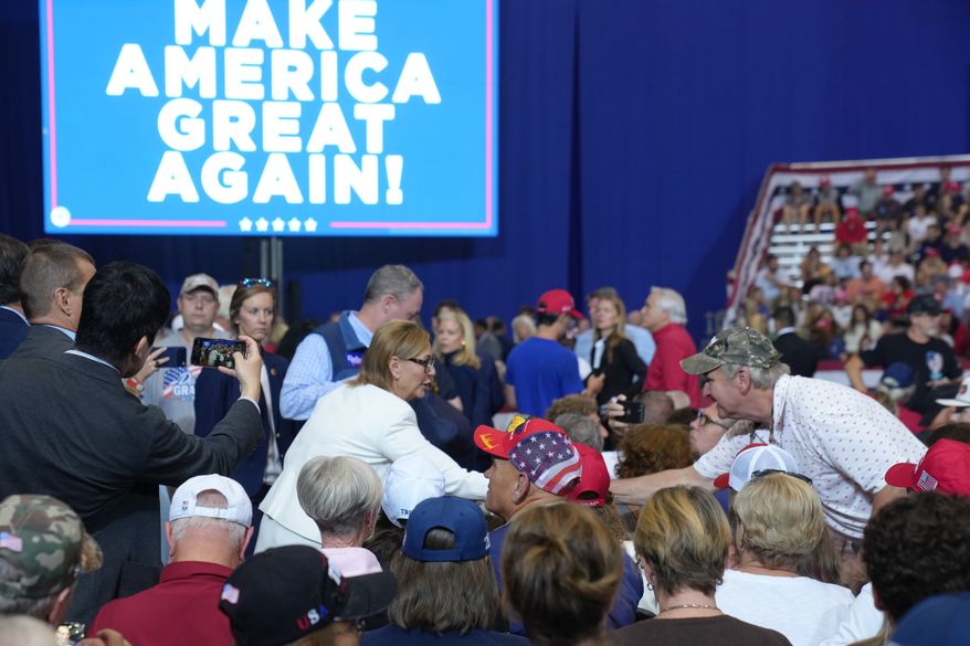 U.S. Sen. Darline Graham, R-S.C., center, shakes hands with a supporter ahead of a midterm rally with President Donald Trump Wednesday, Oct. 21, 2026, in Pendleton, S.C. (AP Photo/Meg Kinnard)