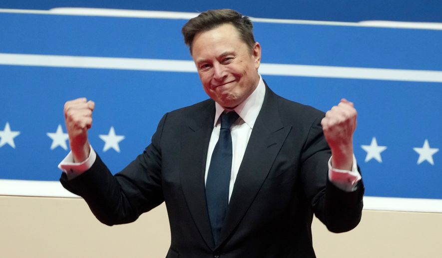Elon Musk arrives to speak at an indoor Presidential Inauguration parade event in Washington, Jan. 20, 2025. (AP Photo/Matt Rourke, File)