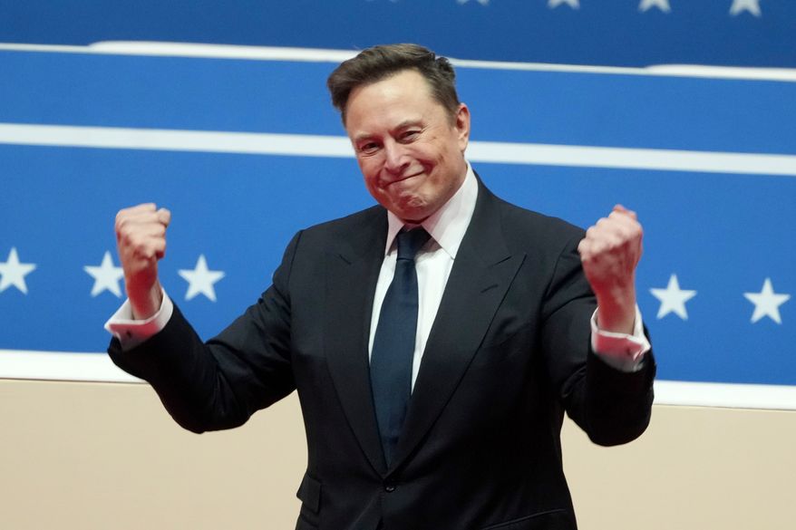 Elon Musk arrives to speak at an indoor Presidential Inauguration parade event in Washington, Jan. 20, 2025. (AP Photo/Matt Rourke, File)