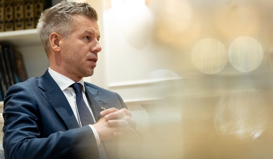 Hungary Prime Minister Peter Magyar speaks during an interview with The Associated Press in Budapest, Tuesday, Oct. 20, 2026. (AP Photo/Rudolf Karancsi Albert)