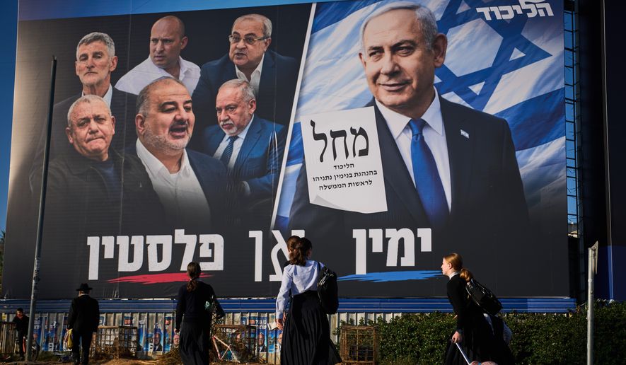 People walk past a Likud party campaign billboard featuring Israeli Prime Minister Benjamin Netanyahu alongside opposition party leaders and bearing the Hebrew slogan "Right or Palestine," ahead of Israel's general election, in Beni Brak, Israel, Sunday, Oct. 18, 2026. (AP Photo/Oded Balilty, File)