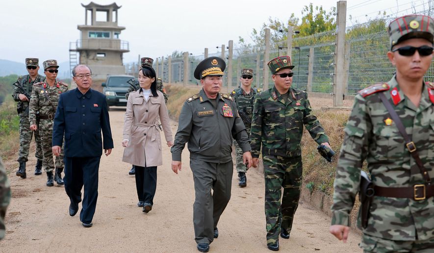 In this photo provided Wednesday, Oct. 21, 2026, by the North Korean government, Kim Yo-jong, center left, sister of North Korean leader Kim Jong-un, visits front-line areas with military officials in North Korea on Tuesday, Oct. 20, 2026. Independent journalists were not given access to cover the event depicted in this image distributed by the North Korean government. The content of this image is as provided and cannot be independently verified. (Korean Central News Agency/Korea News Service via AP)