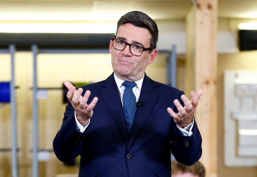 Britain's Prime Minister Andy Burnham delivers a speech focusing on the forming of closer ties with the Scottish government in Motherwell, Scotland, Friday, Oct. 16, 2026. (Jeff J Mitchell/Pool Photo via AP)