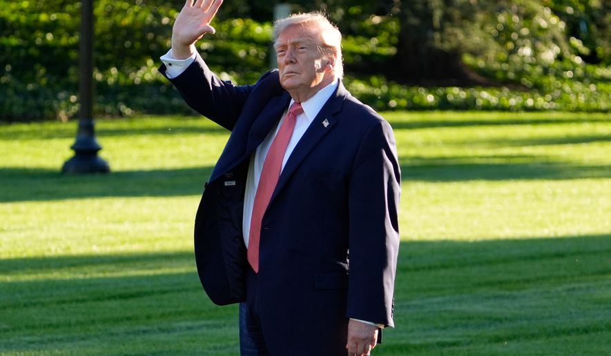 President Donald Trump waves as he walks to depart on Marine One from the South Lawn of the White House, Tuesday, Oct. 20, 2026, in Washington. (AP Photo/Manuel Balce Ceneta)