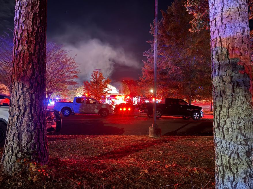 Smoke billows after a fire caused evacuations at Brookdale Senior Living in Clinton, Miss. on Wednesday, Oct. 21, 2026. (AP Photo/Sophie Bates)