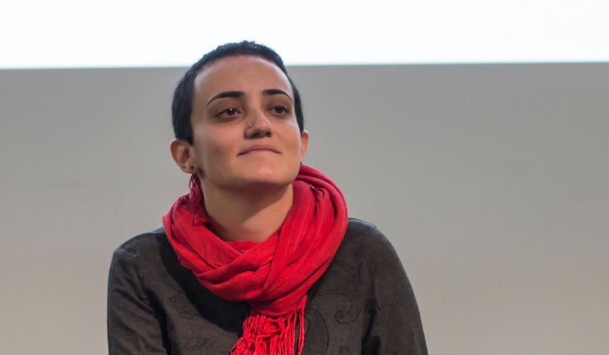 Lina Attalah, editor-in-chief of Mada Masr, participates in a panel discussion at cultural center in Cairo, Egypt, Nov. 24, 2017. (AP Photo/Roger Anis, File)