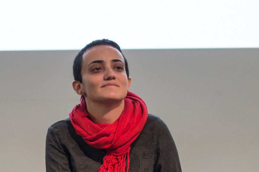 Lina Attalah, editor-in-chief of Mada Masr, participates in a panel discussion at cultural center in Cairo, Egypt, Nov. 24, 2017. (AP Photo/Roger Anis, File)
