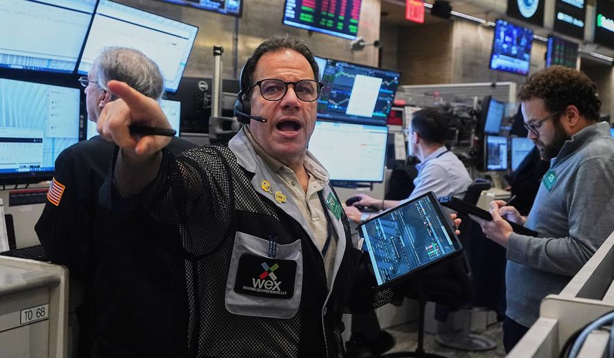 FILE - Options trader Anthony Spina works on the floor of the New York Stock Exchange, Wednesday, Jan. 7, 2026. (AP Photo/Richard Drew, File)