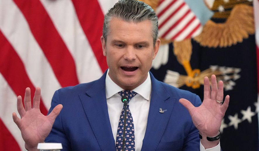 Defense Secretary Pete Hegseth speaks at a roundtable event with President Donald Trump in the East Room of the White House, Wednesday, Oct. 21, 2026, in Washington. (AP Photo/Alex Brandon)