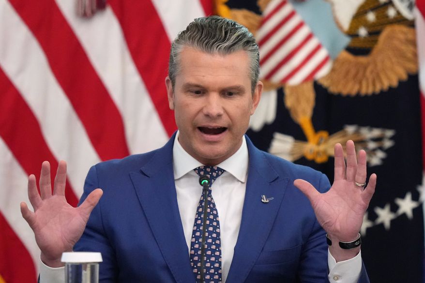 Defense Secretary Pete Hegseth speaks at a roundtable event with President Donald Trump in the East Room of the White House, Wednesday, Oct. 21, 2026, in Washington. (AP Photo/Alex Brandon)