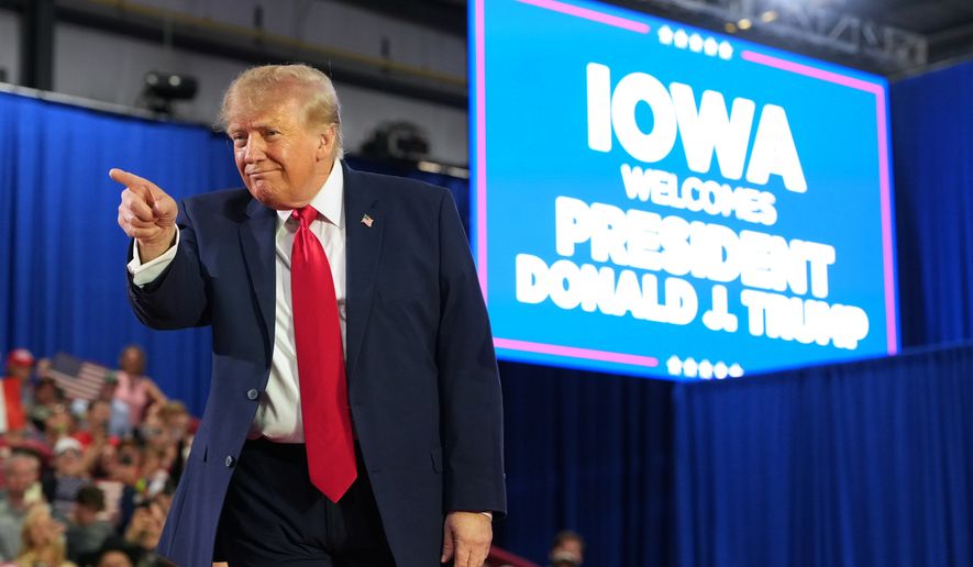 President Donald Trump arrives at a campaign rally at Sioux Gateway Airport, Thursday, Oct. 22, 2026, in Sioux City, Iowa. (AP Photo/Alex Brandon)