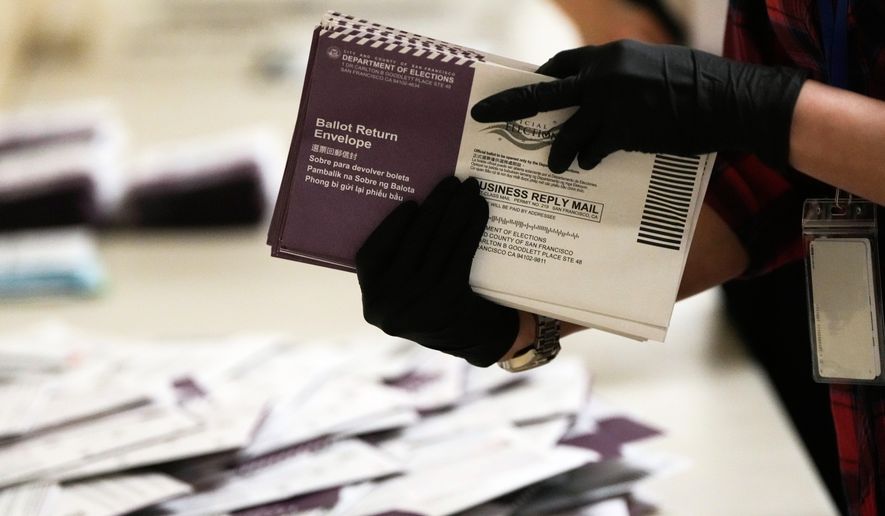 Department of Elections workers sort mail-in ballots for the California primary election at City Hall in San Francisco on Tuesday, June 2, 2026. (AP Photo/Jeff Chiu, File)