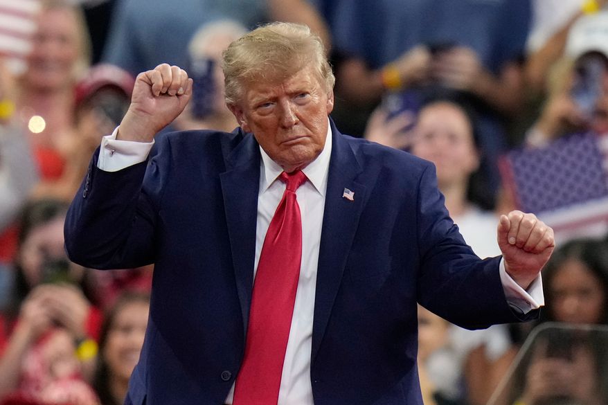President Donald Trump dances as he departs after speaking during a campaign rally, Friday, Oct. 23, 2026, at Alico Arena on the campus of Florida Gulf Coast University in Fort Myers, Fla. (AP Photo/Chris O'Meara)