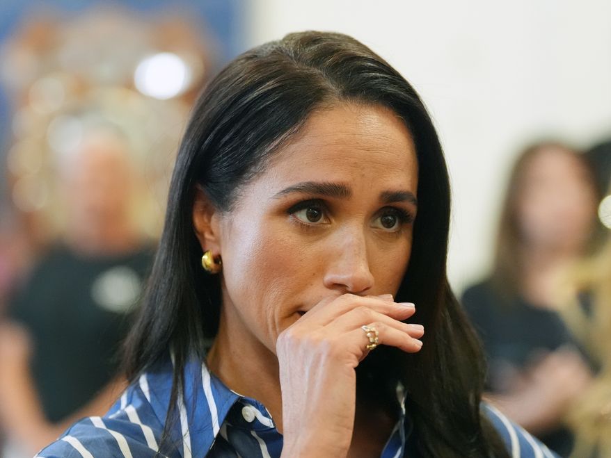 Meghan Markle, the Duchess of Sussex, meets volunteer first responders from the Bondi Surf Bathers' Life Saving Club during a visit to Bondi Beach, Australia, on April 17, 2026. (Jonathan Brady/Pool Photo via AP) **FILE**
