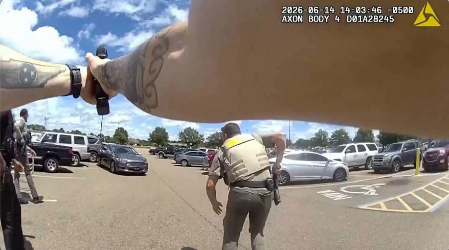 This image provided by the Mississippi Department of Public Safety shows body-camera footage of officers responding to a scene where a 1-year-old boy was shot by law enforcement in Senatobia, Miss., on June 14, 2026. (Mississippi Department Of Public Safety via AP)