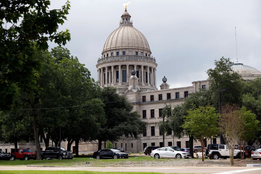 FILE - The Mississippi State Capitol in Jackson, Miss., on July 6, 2020. (AP Photo/Rogelio V. Solis, File)