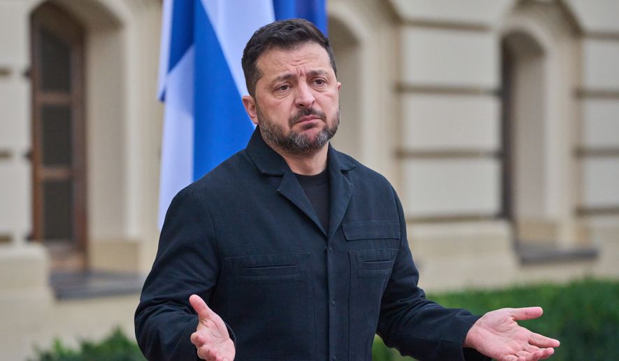 Ukraine's President Volodymyr Zelenskyy answers media questions before his meeting with Finnish Prime Minister Petteri Orpo in Kyiv, Ukraine, Thursday Oct. 22, 2026. (AP Photo/Efrem Lukatsky)
