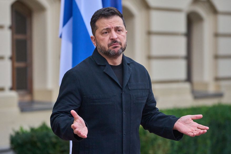 Ukraine's President Volodymyr Zelenskyy answers media questions before his meeting with Finnish Prime Minister Petteri Orpo in Kyiv, Ukraine, Thursday Oct. 22, 2026. (AP Photo/Efrem Lukatsky)