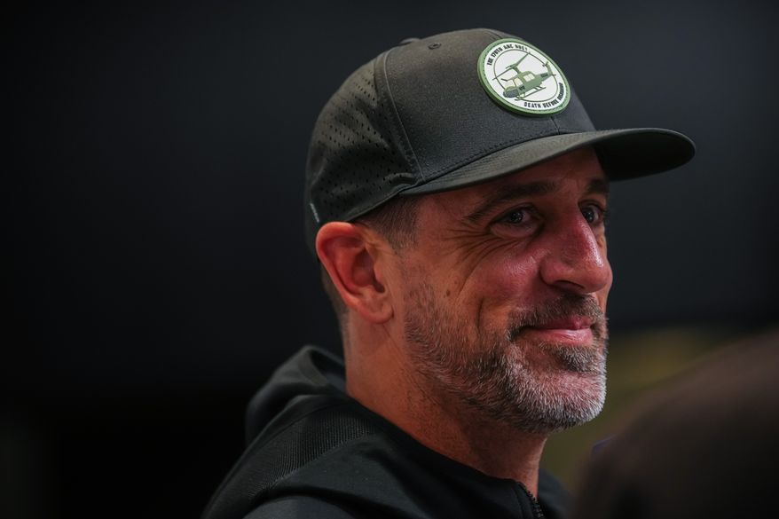 Pittsburgh Steelers quarterback Aaron Rodgers leaves a press conference in Paris, Friday, Oct. 23, 2026. (AP Photo/Aurelien Morissard)