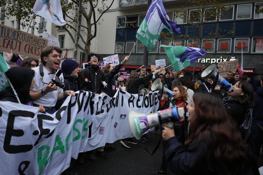 Students chant slogans during a demonstration against rising living costs in Paris, Saturday, Oct. 24, 2026. (AP Photo/Thibault Camus)