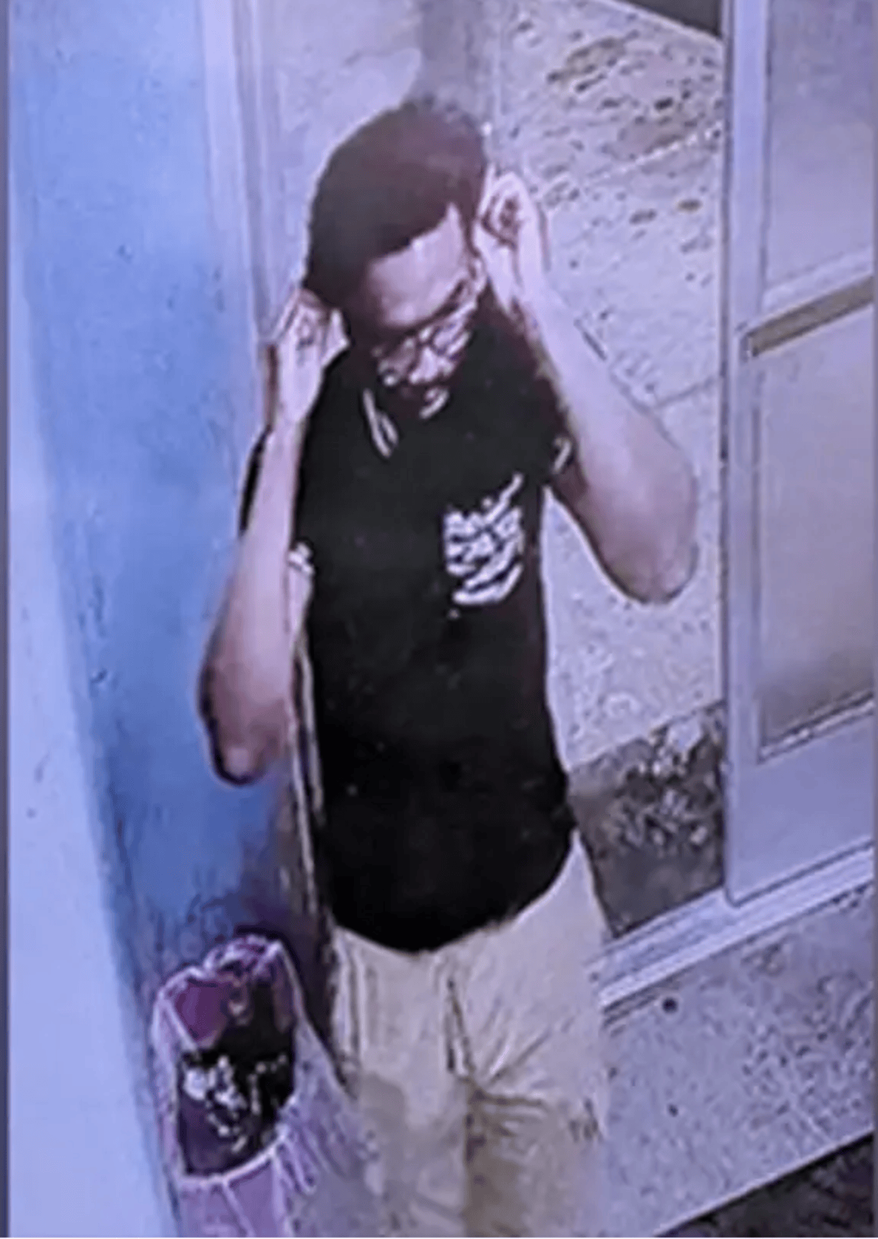 FBI surveillance footage of Inique Hinton, who was charged with attempted destruction of government property on Oct. 23, 2026. (Credit: FBI)
