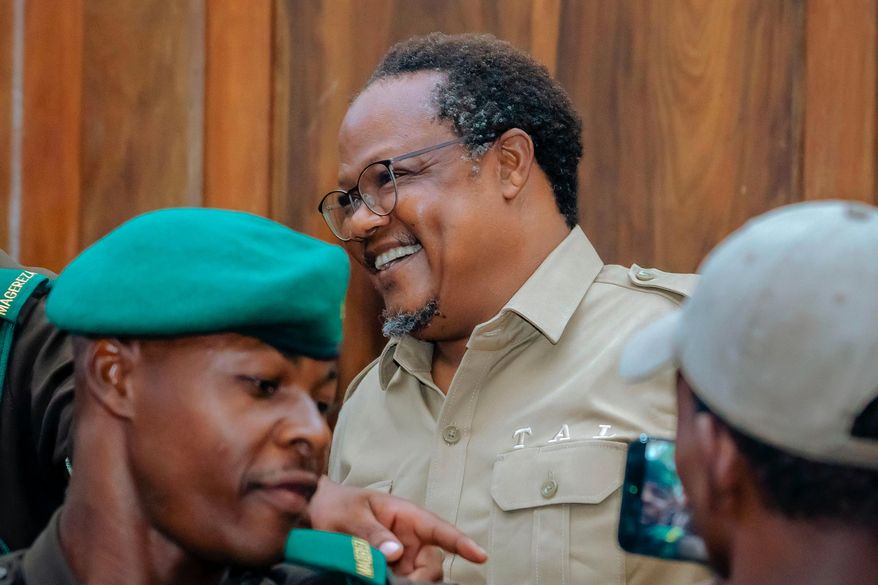 FILE -Main opposition leader Tundu Lissu arrives at the High Court of Tanzania as his treason trial continues before a three-judge bench in Dar es Salaam, Tanzania, Feb 9, 2026. (AP Photo/Florence Majani, File)