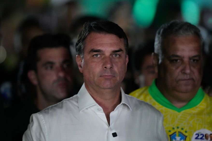 Opposition presidential candidate Sen. Flavio Bolsonaro arrives at his election night event after the presidential runoff in Brasilia, Brazil, Sunday, Oct. 25, 2026.(AP Photo/Eraldo Peres)