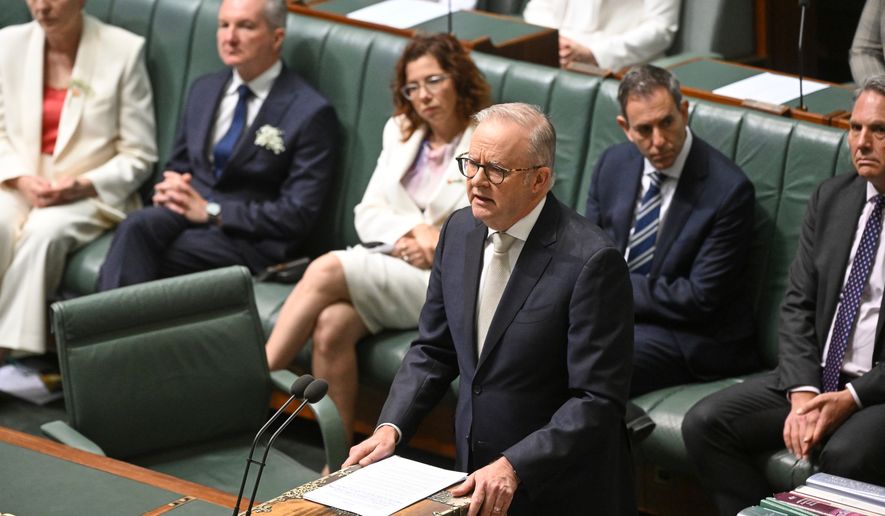 Australian Prime Minister Anthony Albanese pays tribute to independent lawmaker Helen Haines, who was critically injured on Oct. 19 when a driver struck her with a vehicle, at Parliament House in Canberra, Australia, Monday, Oct. 26, 2026. (Lukas Coch/AAP Image via AP)